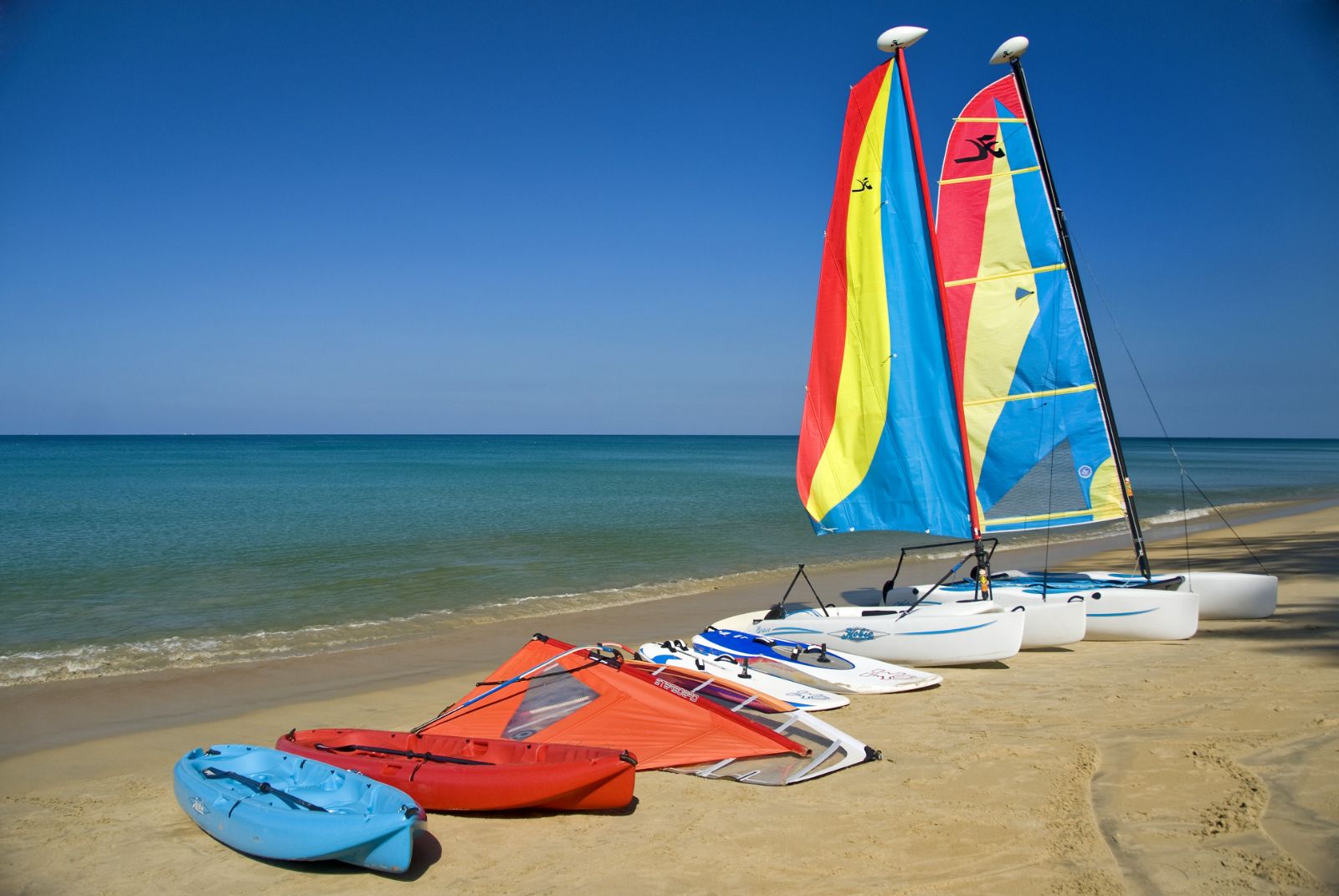 Watersports gear on the beach at Anantara Mai Khao Phuket Villas in Thailand