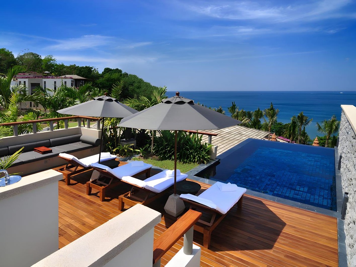 Sunbeds and rooftop pool at Andara Resort & Villas in the Phuket region of Thailand