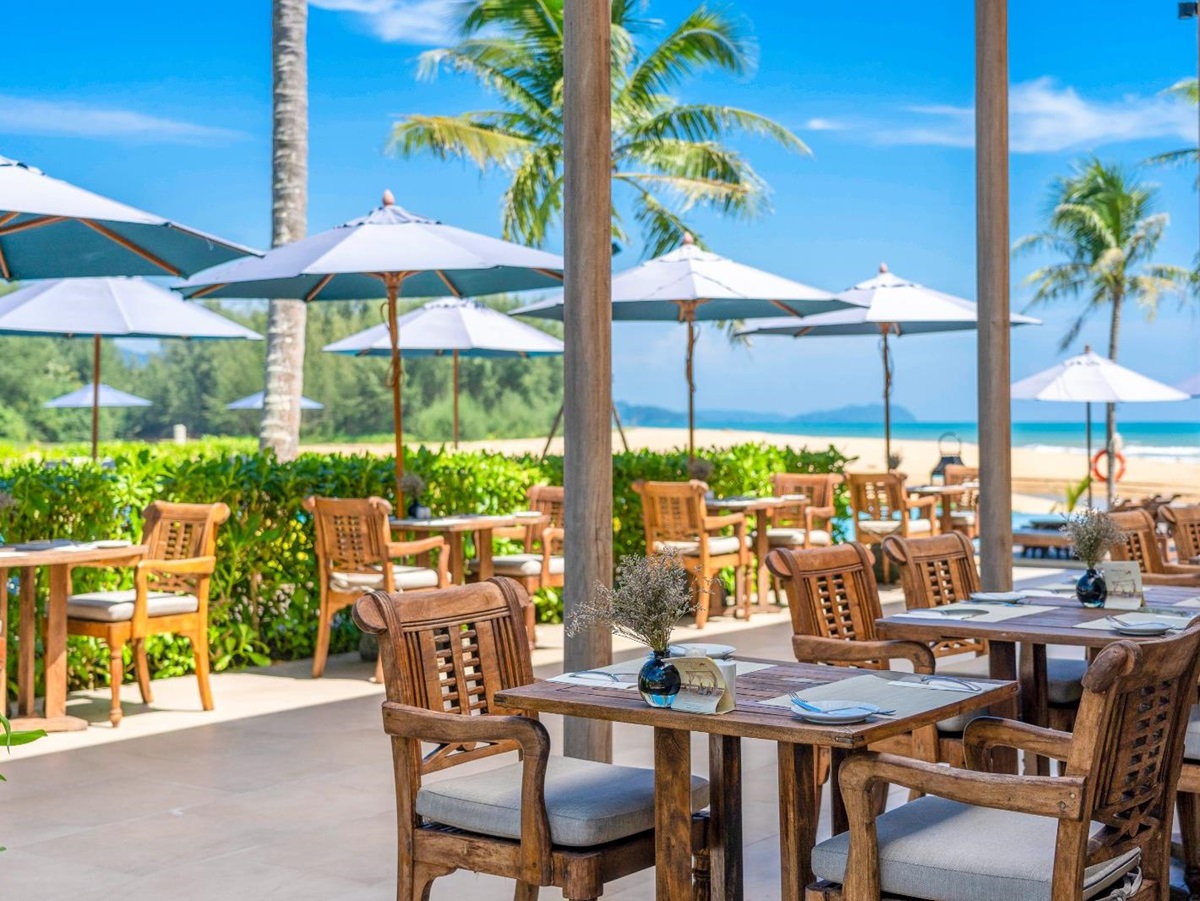 Beach bar and grill outdoor terrace at Devasom Khao Lak on the south coast of Thailand