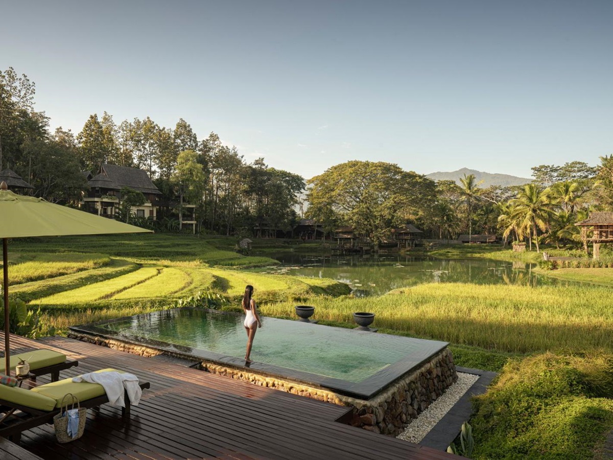 Lower pool area overlooking the rice terraces at luxury resort Four Seasons Chiang Mai