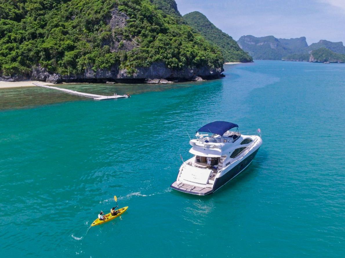 Boat excursion near the grounds of Four Seasons Resort Koh Samui in Thailand