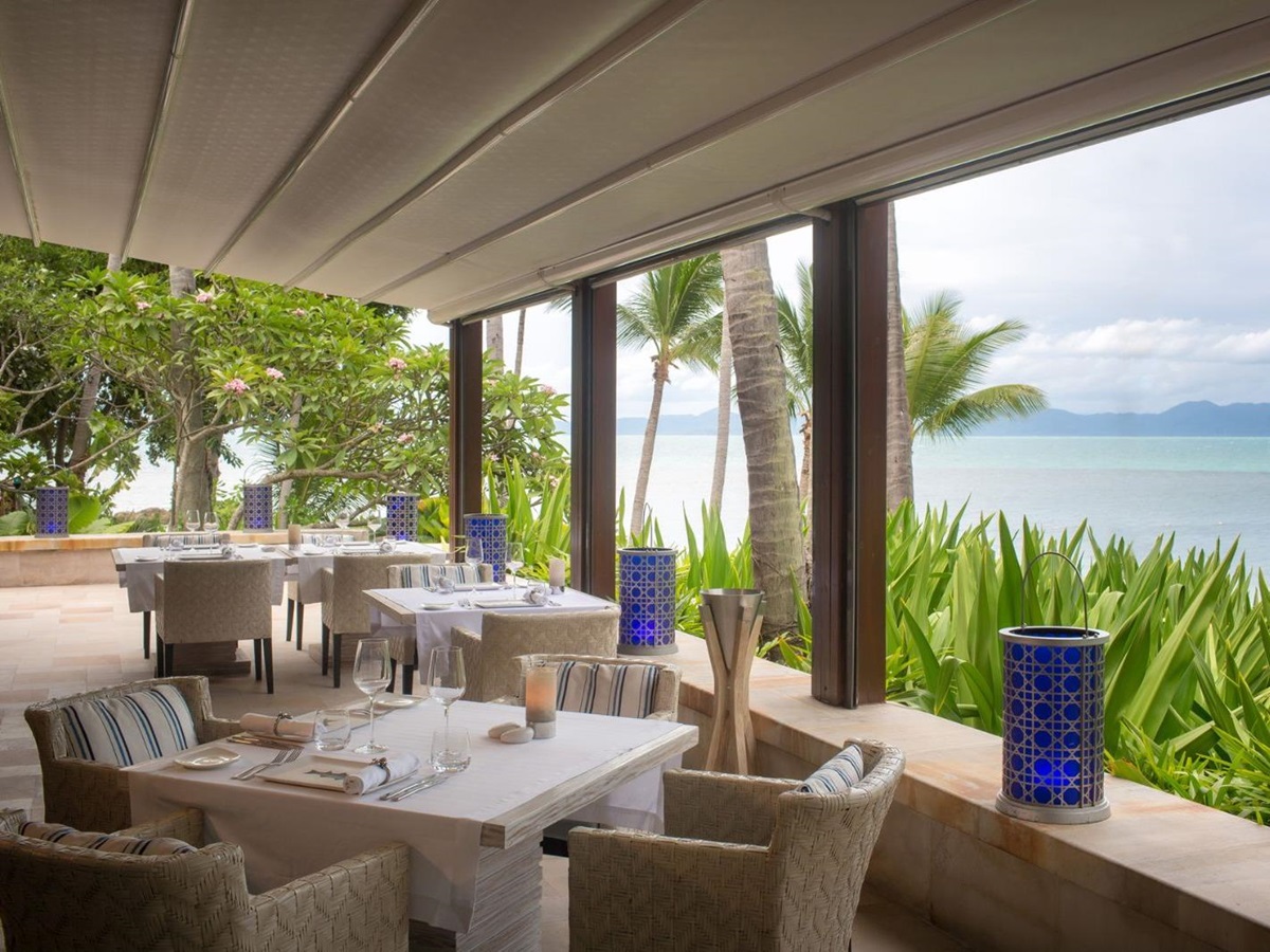 Dining tables prepared for daytime meals at Four Seasons Resort Koh Samui in Thailand