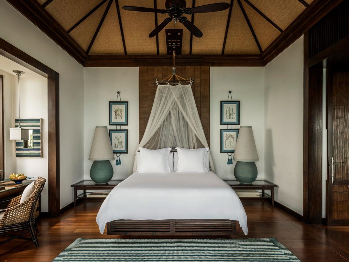 Guest suite bedroom at Four Seasons Resort Koh Samui in Thailand