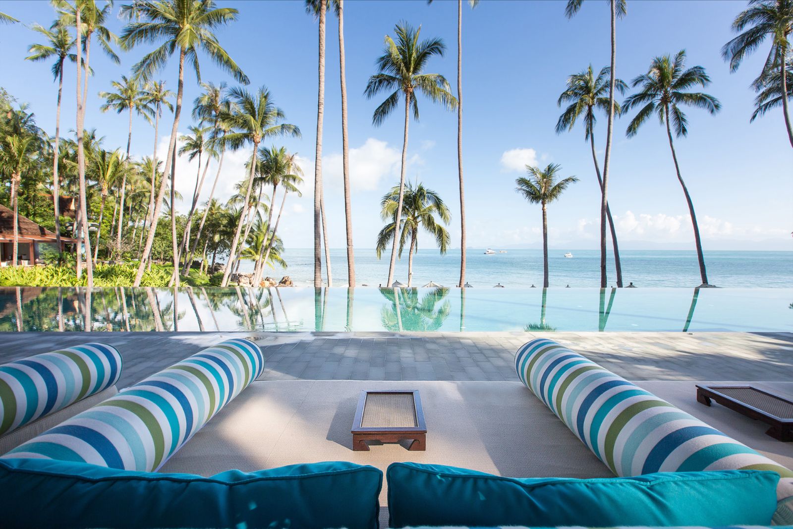 Poolside lounge bed at Four Seasons Resort Koh Samui in Thailand