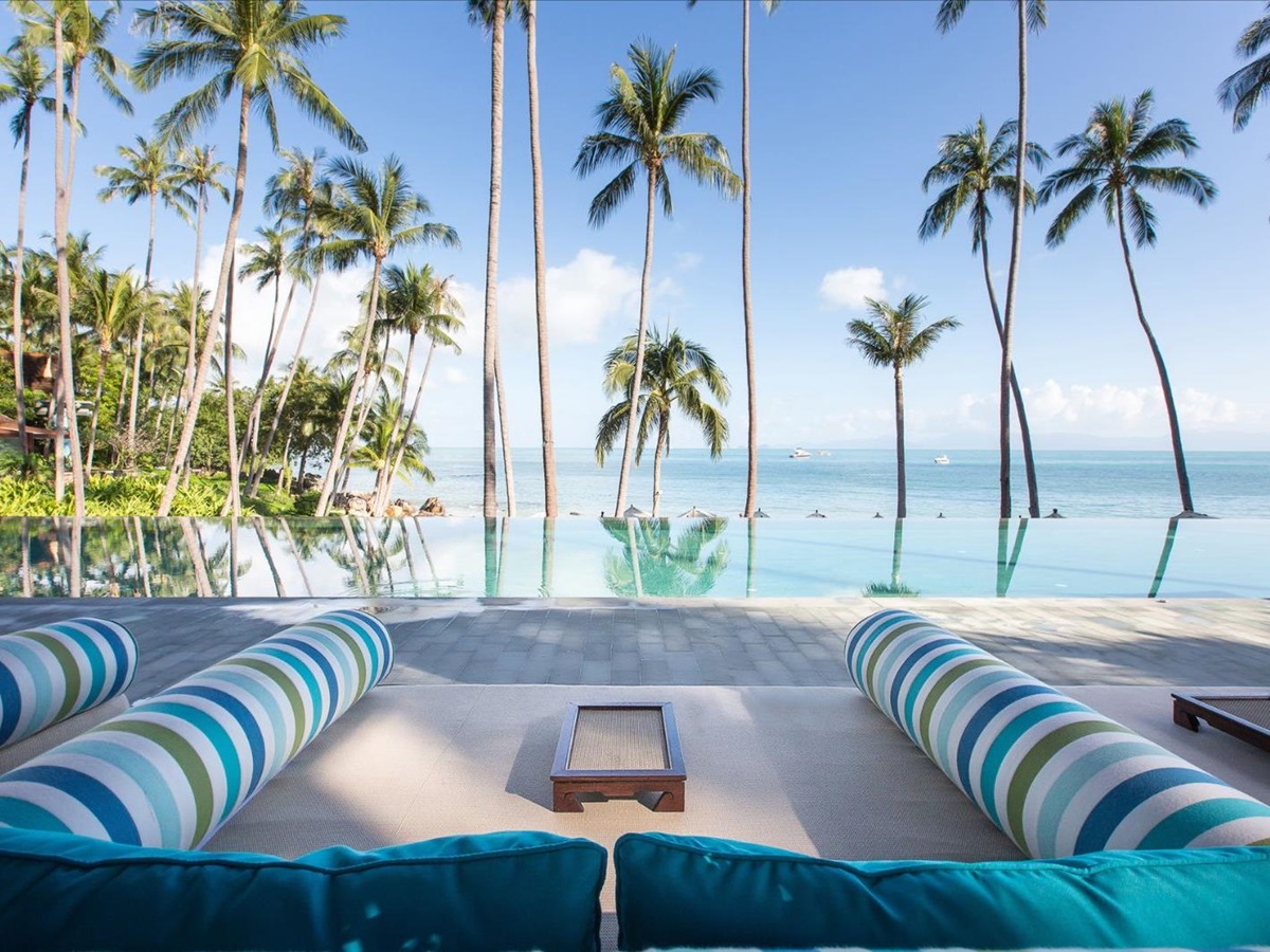 Poolside lounge bed at Four Seasons Resort Koh Samui in Thailand