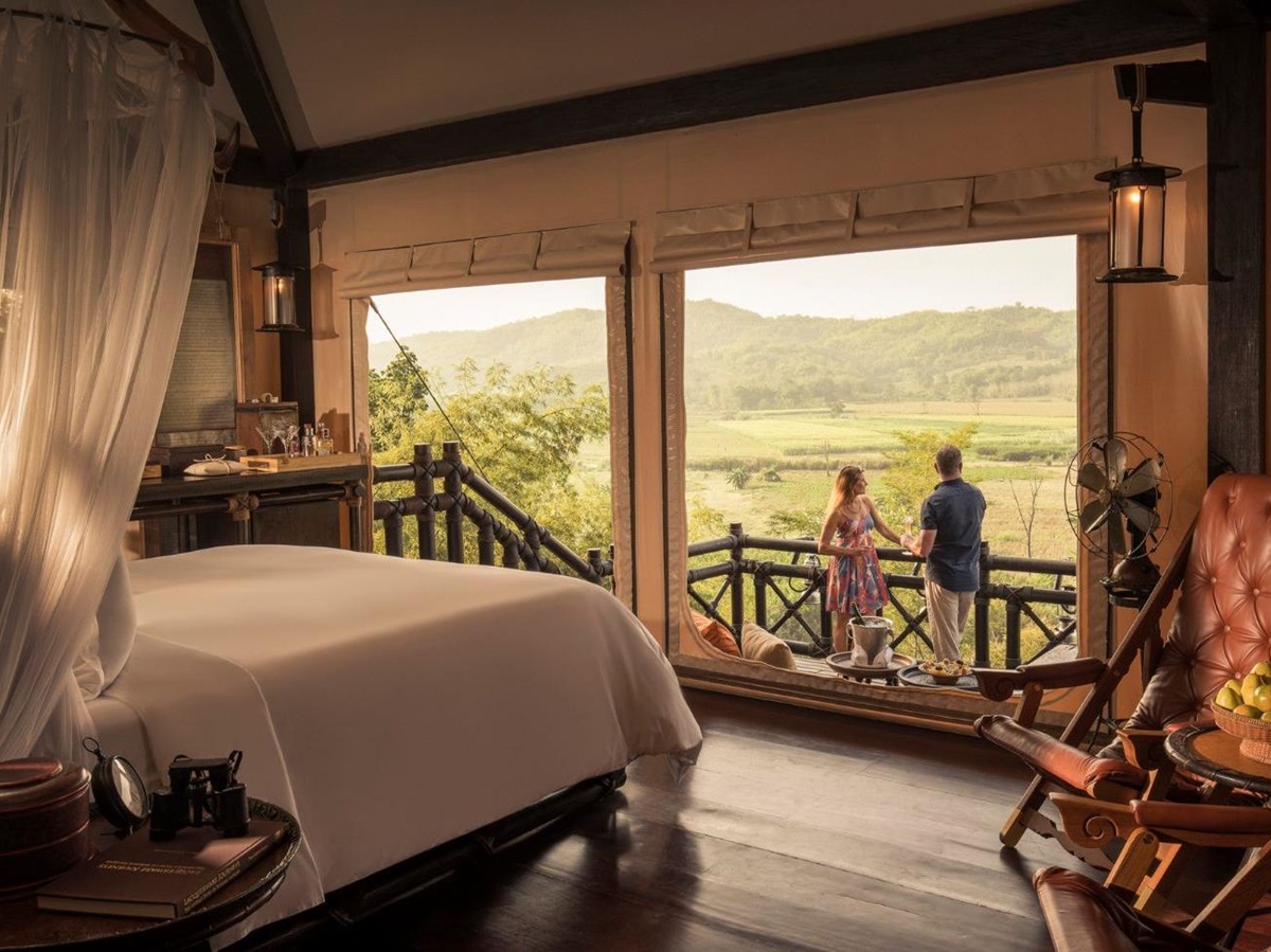 Guest tent bedroom at Four Seasons Tented Camp Golden Triangle in Chiang Rai