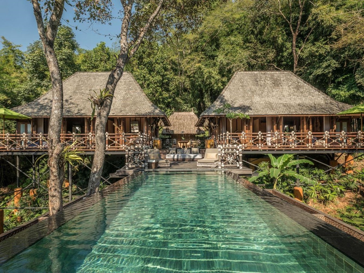 Pool and exterior of a tent at Four Seasons Tented Camp Golden Triangle in Chiang Rai