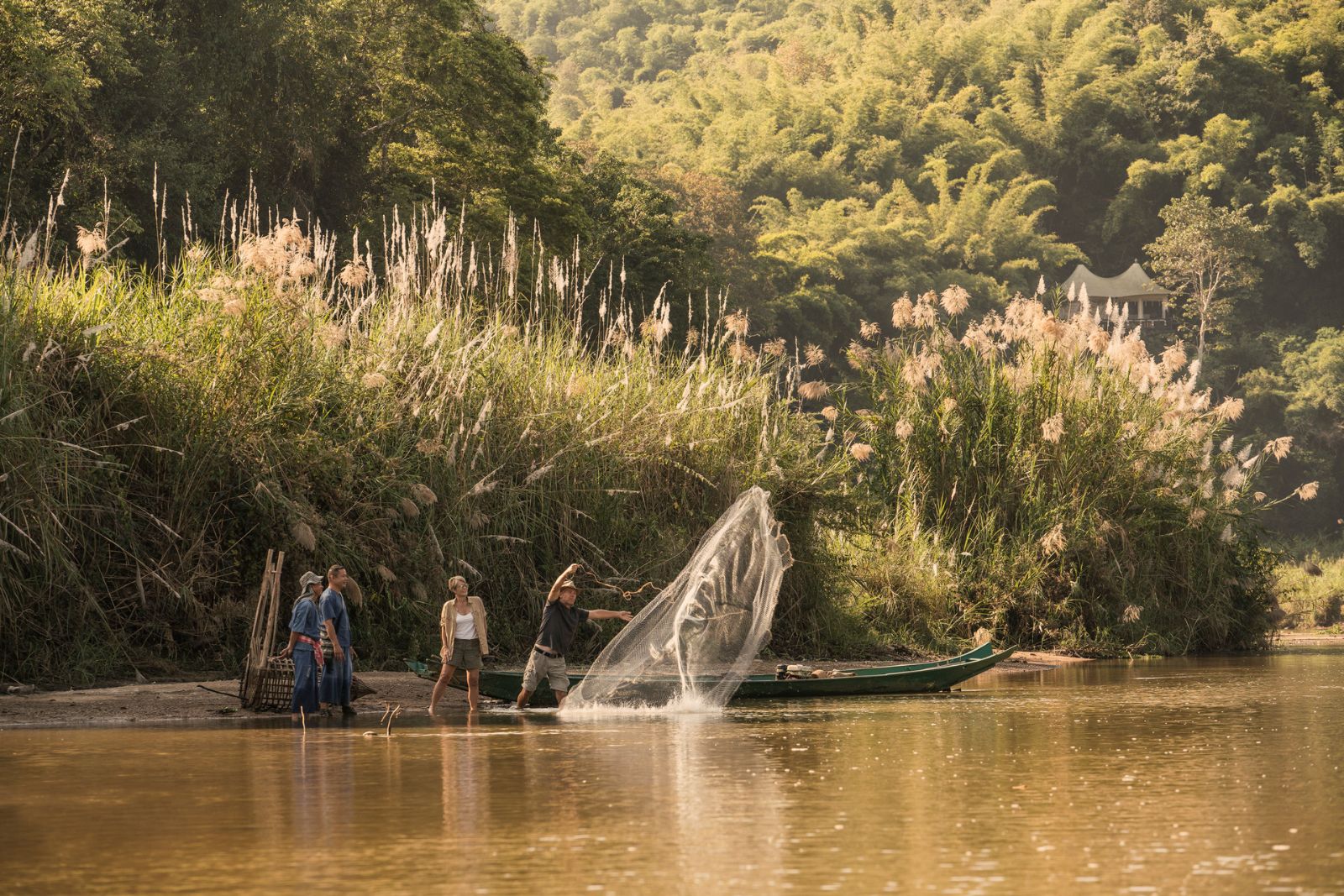 Fishing on the grounds of Four Seasons Tented Camp Golden Triangle in Chiang Rai