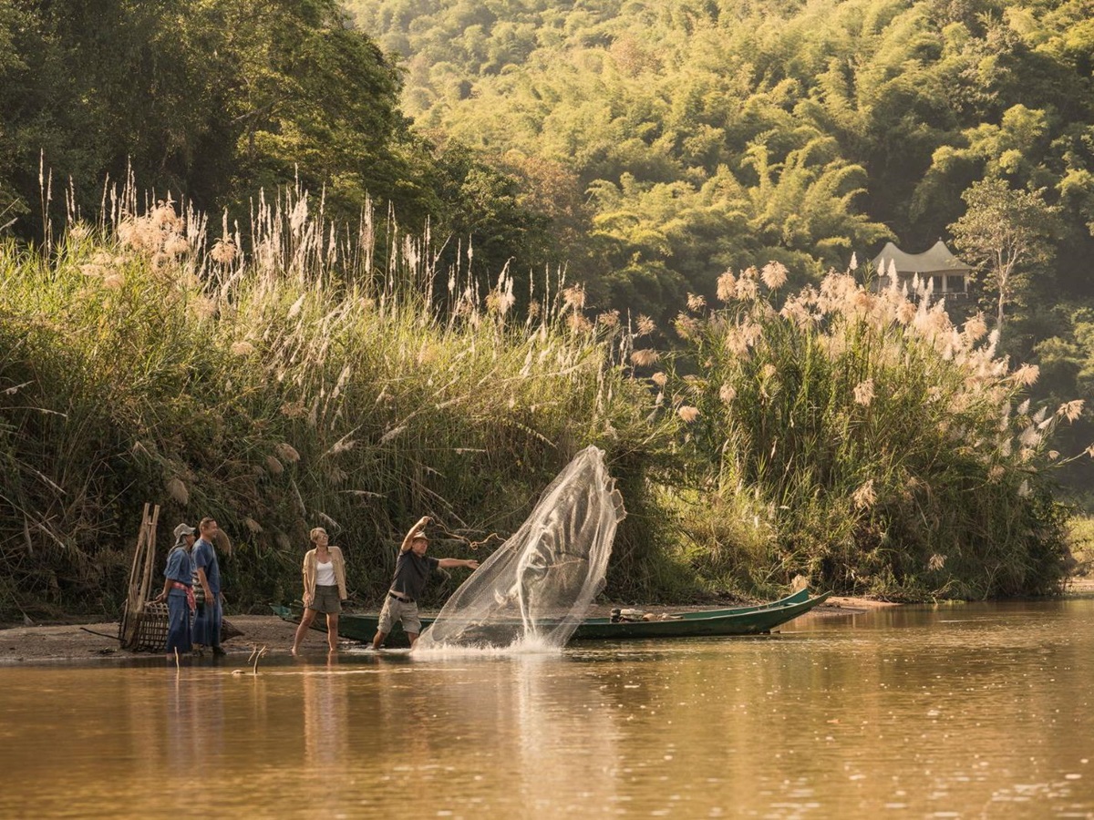 Fishing on the grounds of Four Seasons Tented Camp Golden Triangle in Chiang Rai