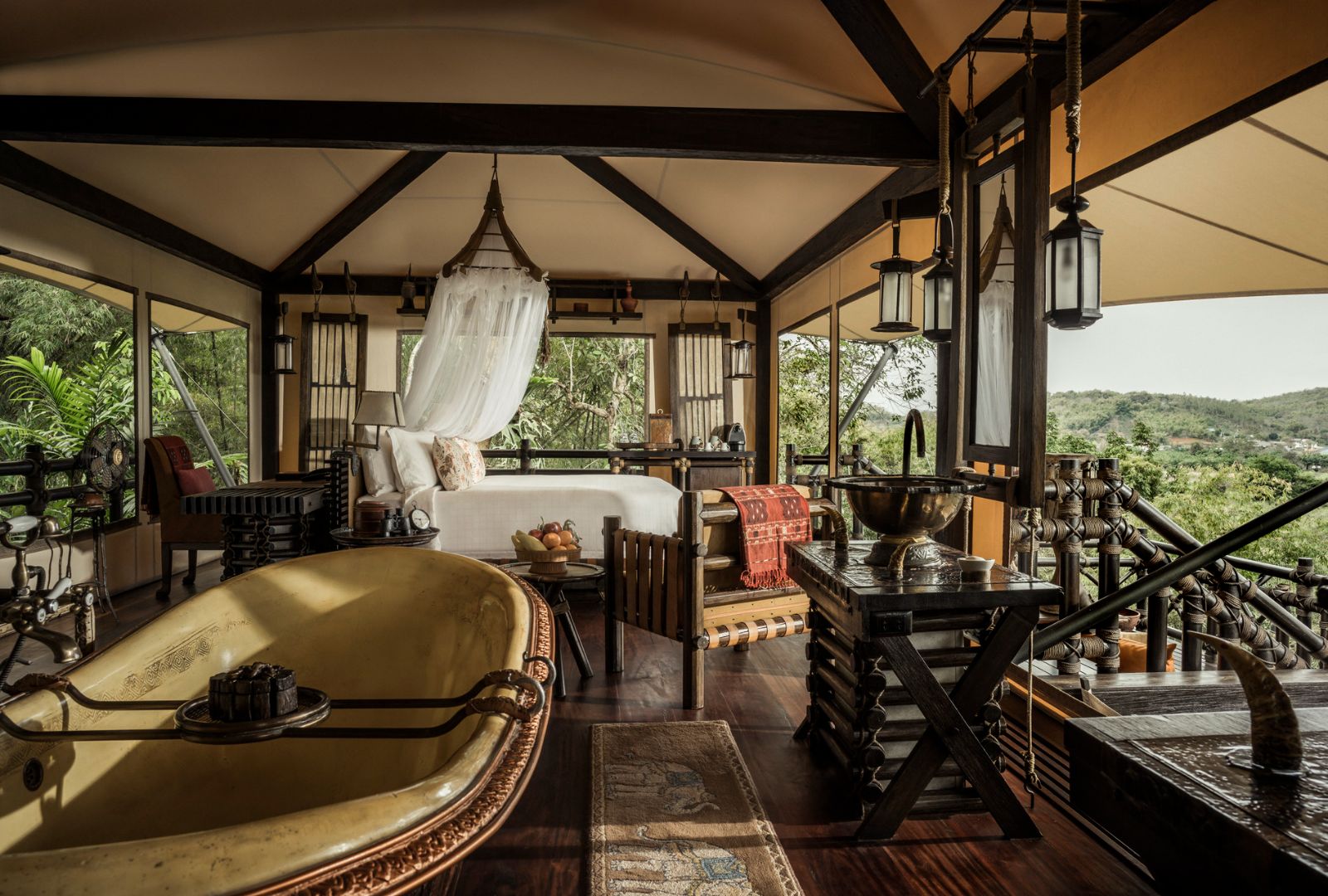 Guest bedroom at Four Seasons Tented Camp Golden Triangle in Chiang Rai
