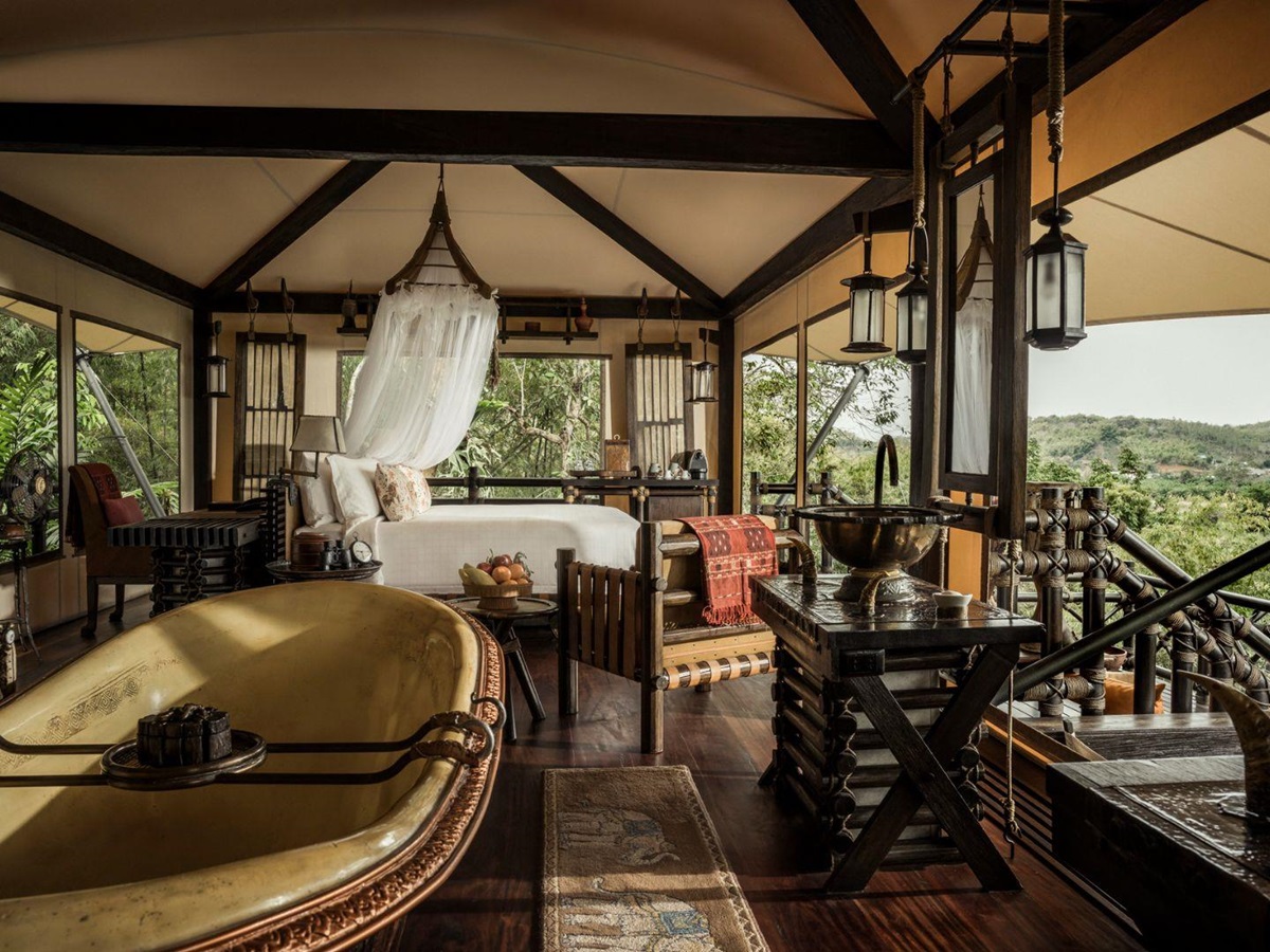 Guest bedroom at Four Seasons Tented Camp Golden Triangle in Chiang Rai
