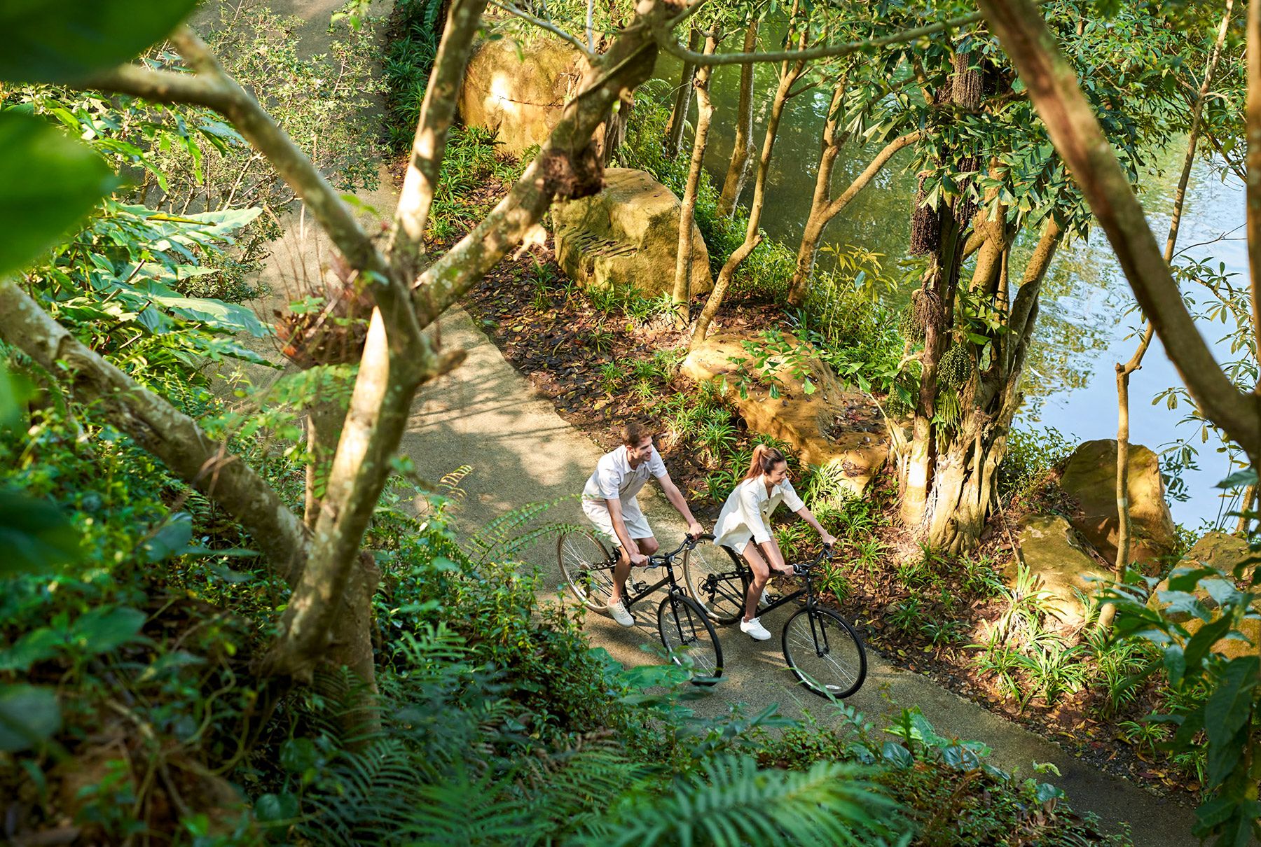 Aerial view of a couple cycling from Intercontinental Khao Yai in Thailand