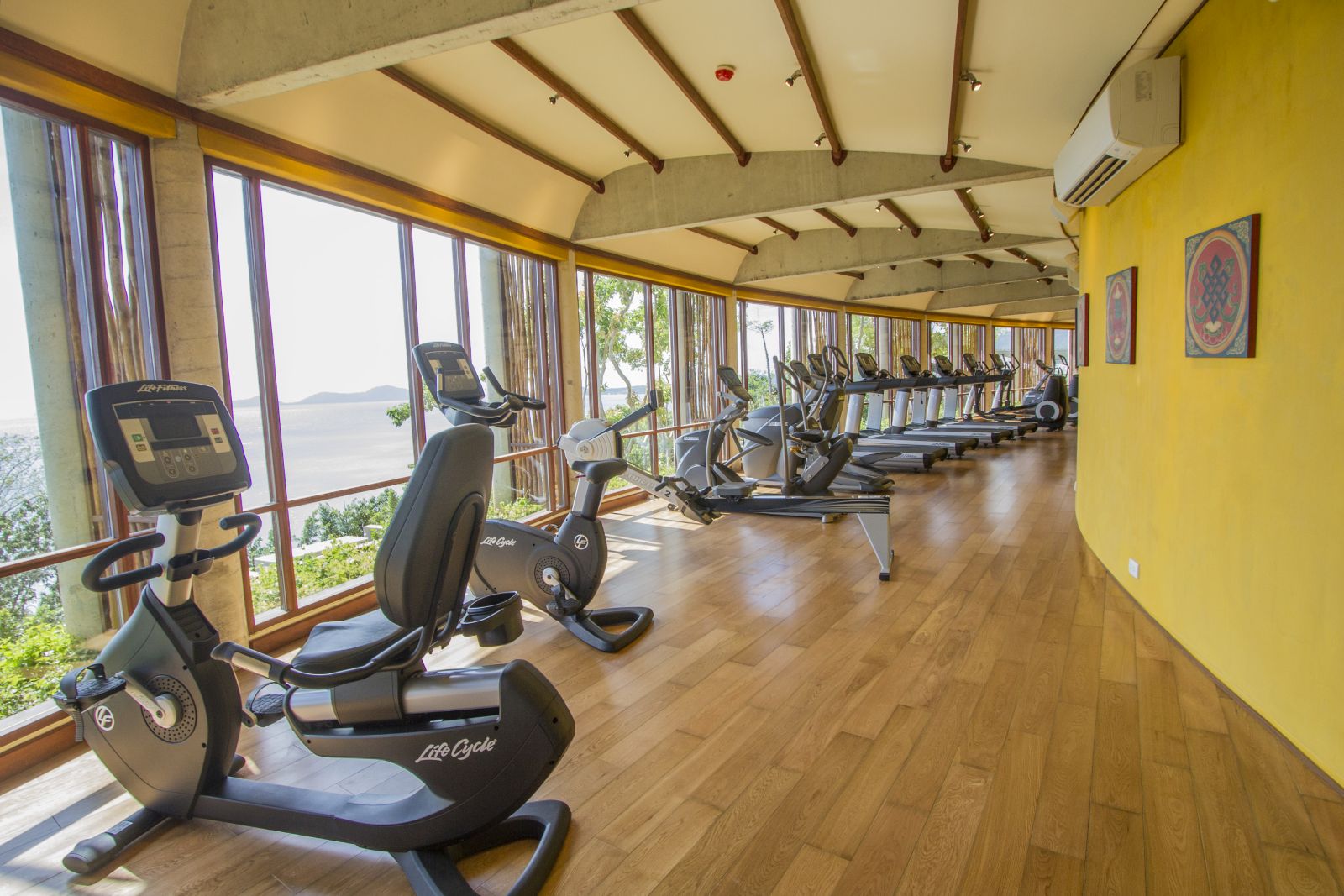 Crosstrainers and treadmills with views over the sea at luxury resort Kamalaya in Koh Samui, Thailand