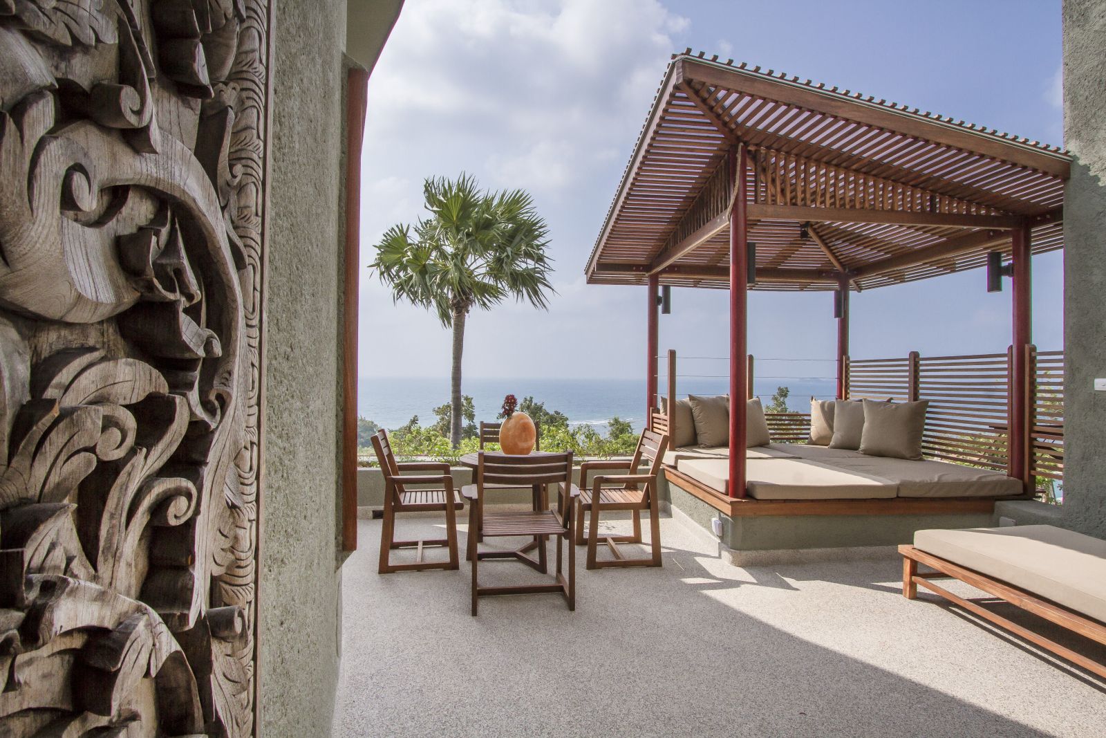 Terrace of a Penthouse Pool Suite with shaded cabana and outdoor dining area at at luxury wellness resort Kamalaya in Thailand