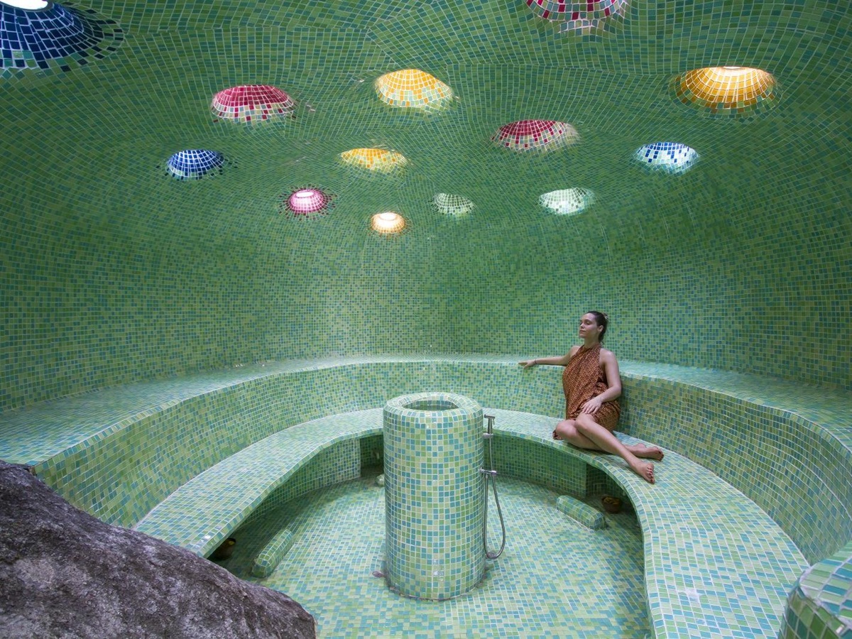 Woman enjoying the steam room at luxury resort Kamalaya in Koh Samui, Thailand