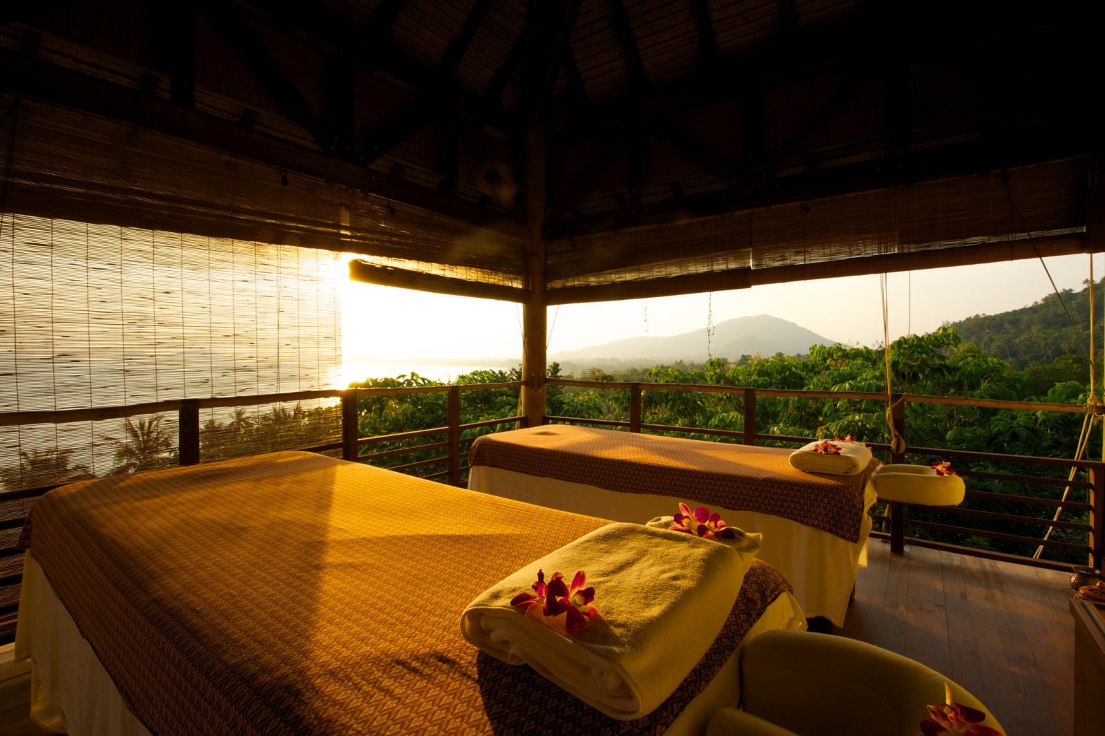 Spa couple's treatment room with views over the gardens and sea at at luxury wellness resort Kamalaya in Thailand