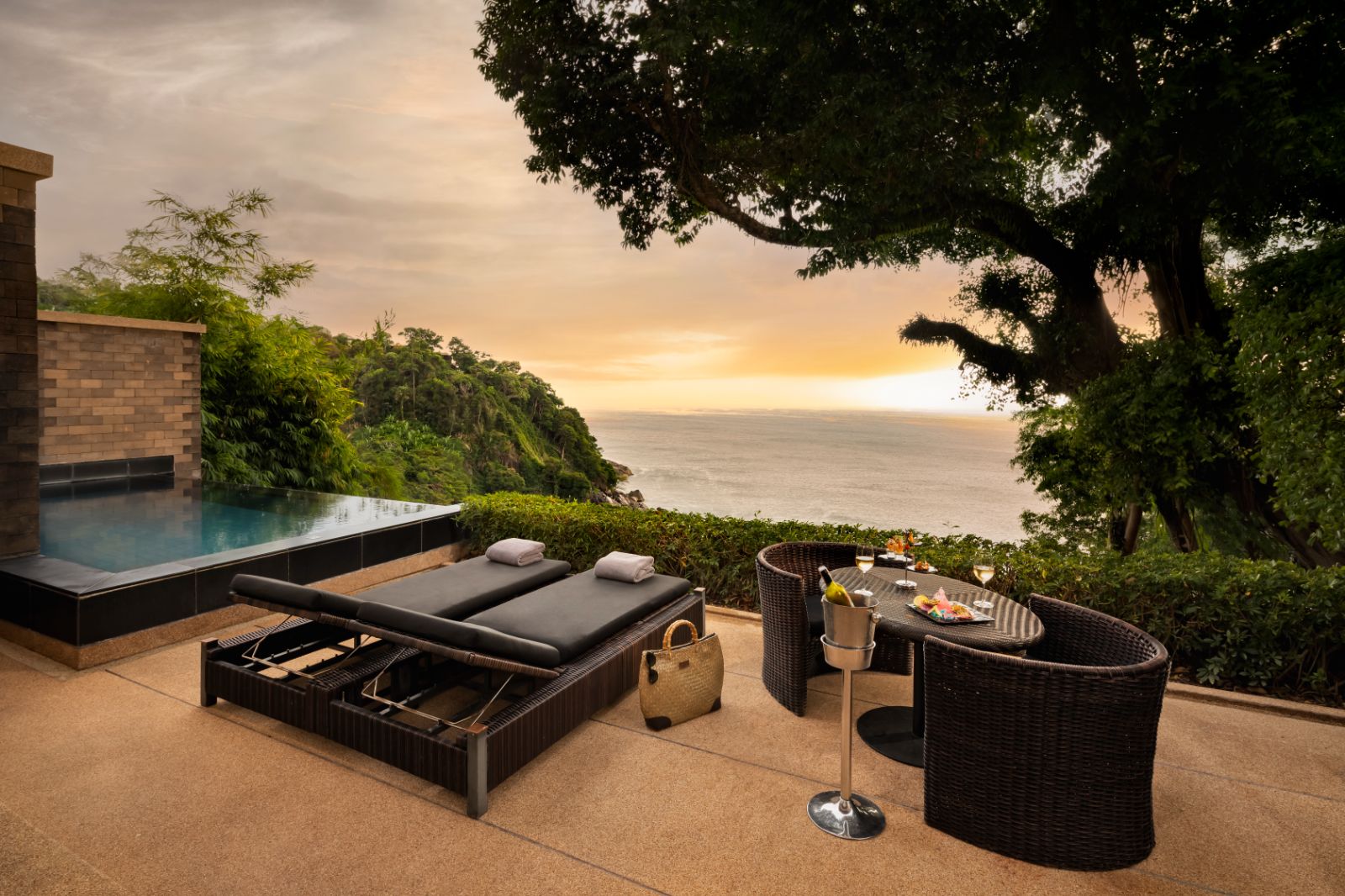 Ocean Pool Suite terrace with plunge pool and sun beds at Paresa resort in the Phuket region of Thailand