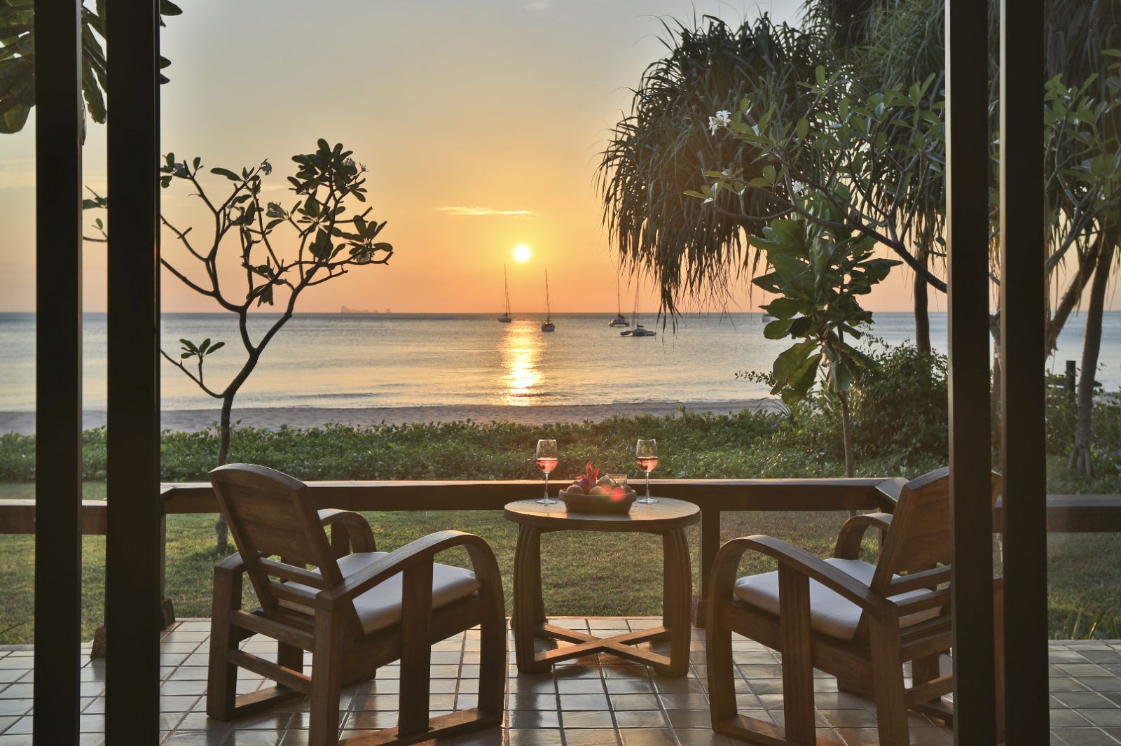 Beachside Villa Terrace at sunset looking out to the ocean at luxury resort Pimalai 