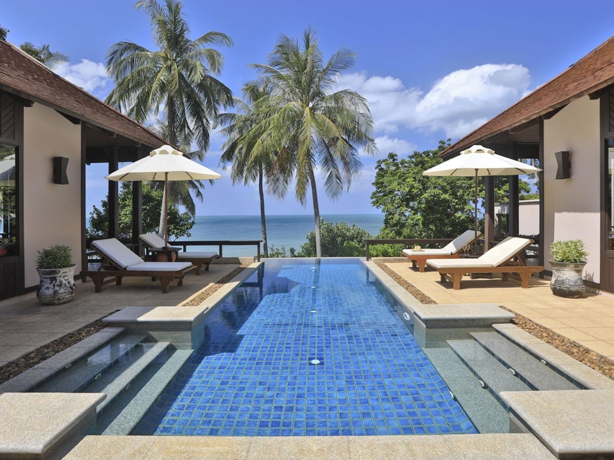 Pool and terrace of a beachside villa at luxury resort Pimalai