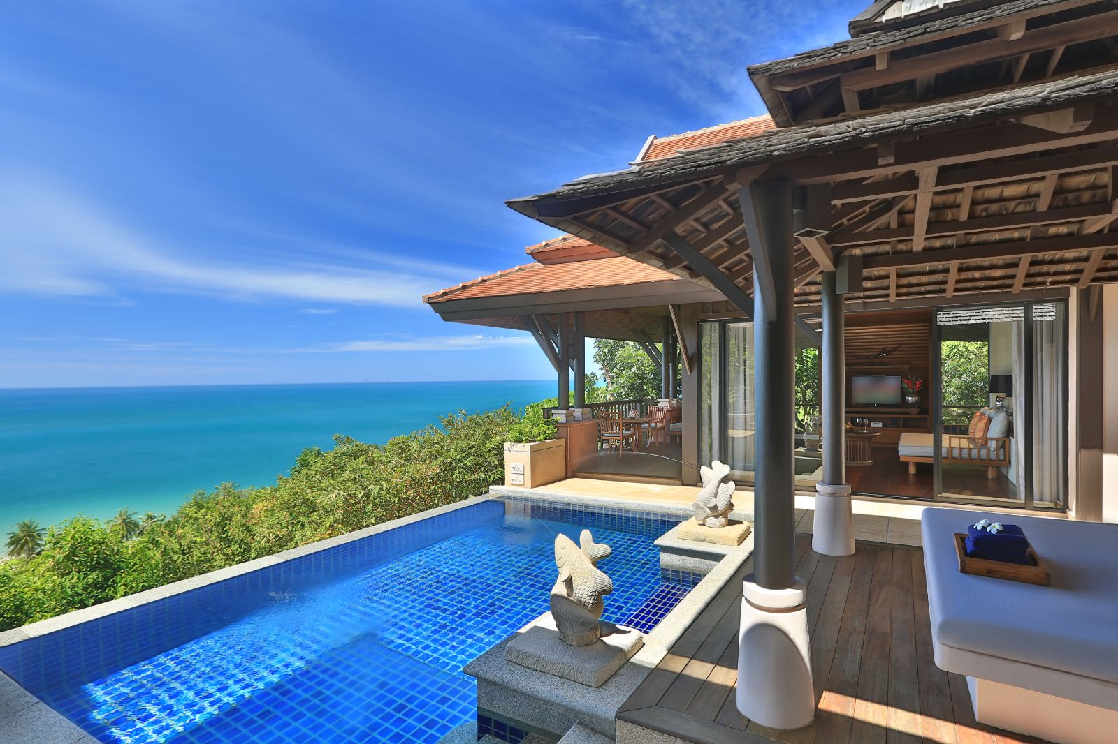 Outdoor pool in a hillside ocean view villa at luxury resort Pimalai 