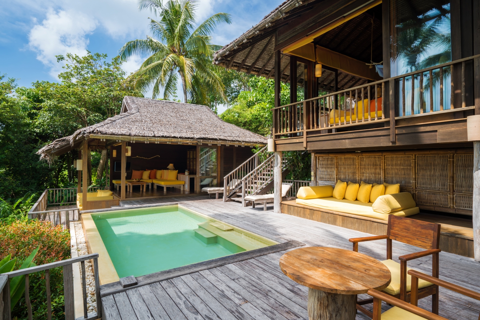 Beach front Pool Villa with outdoor seating