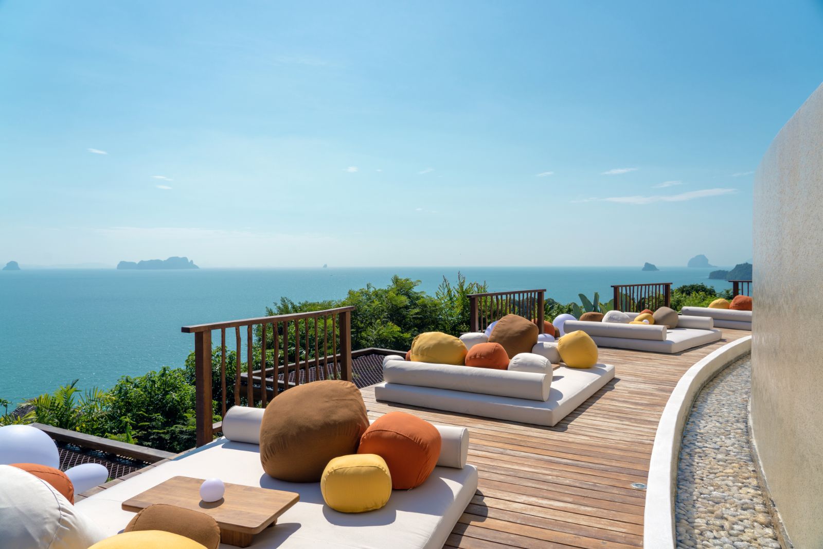 Lower pool deck overlooking the ocean  at luxury resort Six Senses Yao Noi