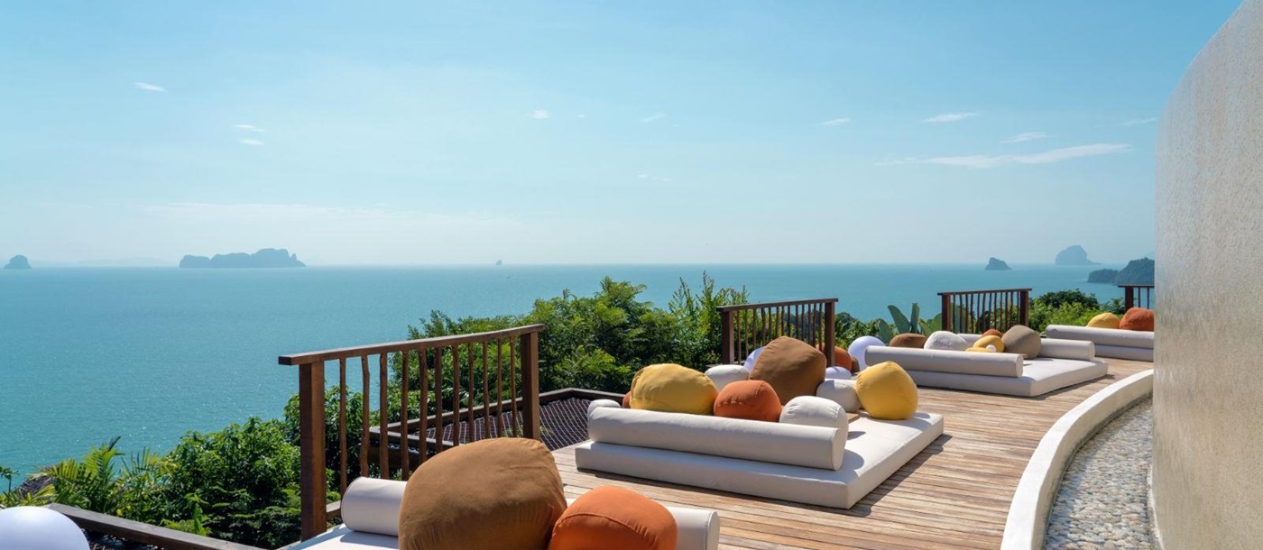 Lower pool deck overlooking the ocean  at luxury resort Six Senses Yao Noi