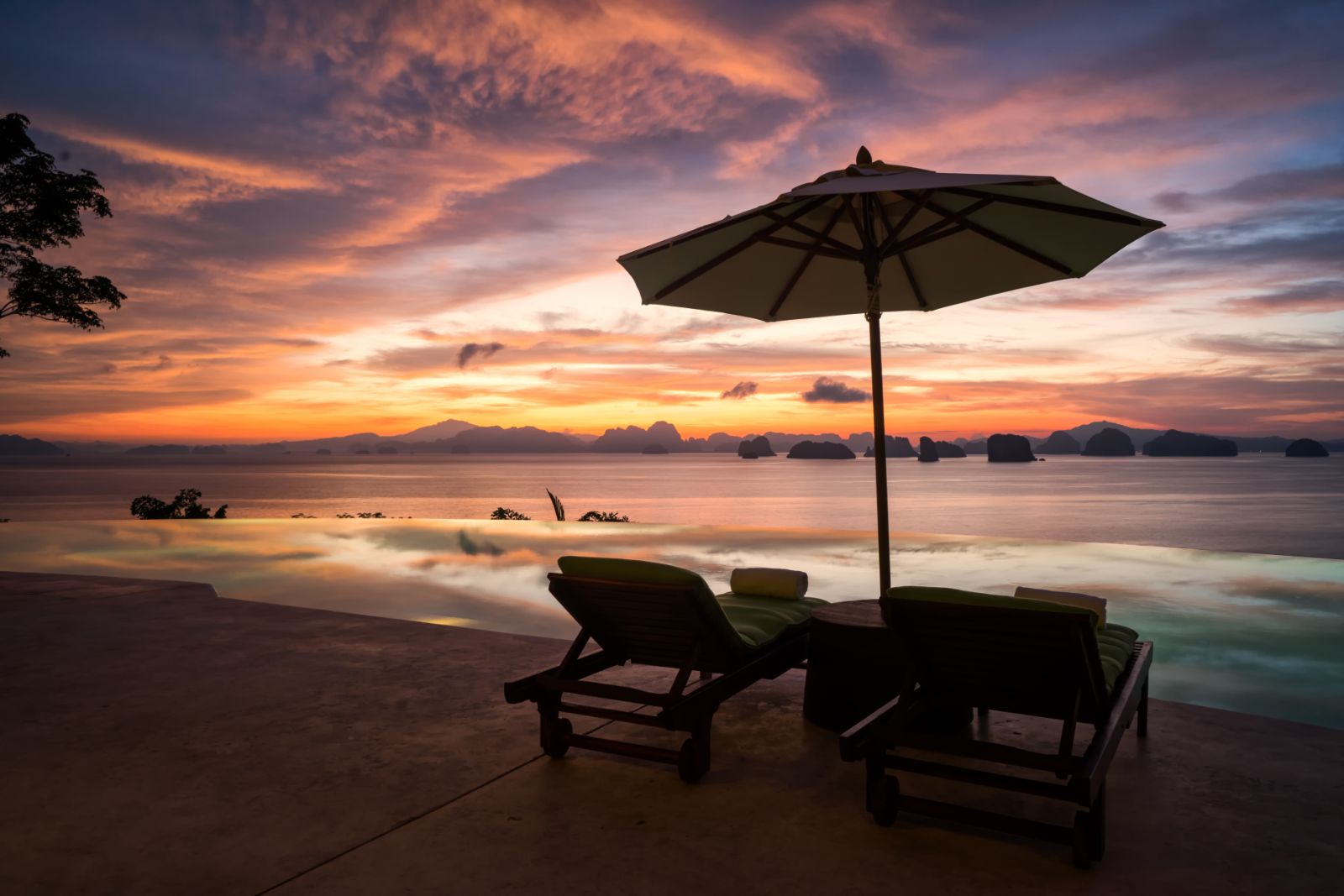 Sunset on the beach at luxury resort Six Senses Yao Noi