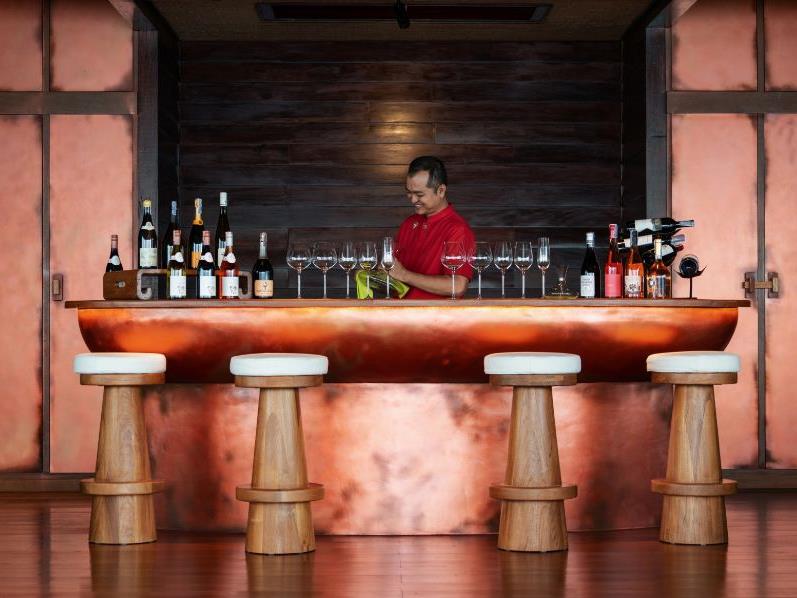 Wine tasting set up in the tasting room at the hilltop at luxury resort six sense yao noi