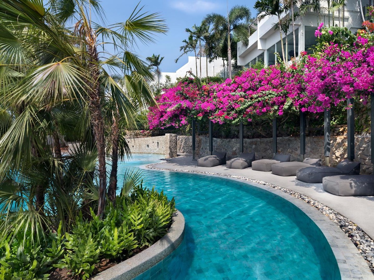 Curved edge pool at The Nai Harn resort in the Phuket region of Thailand