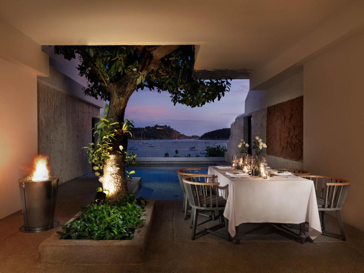 Family room terrace with al fresco dining table at The Nai Harn resort in the Phuket region of Thailand