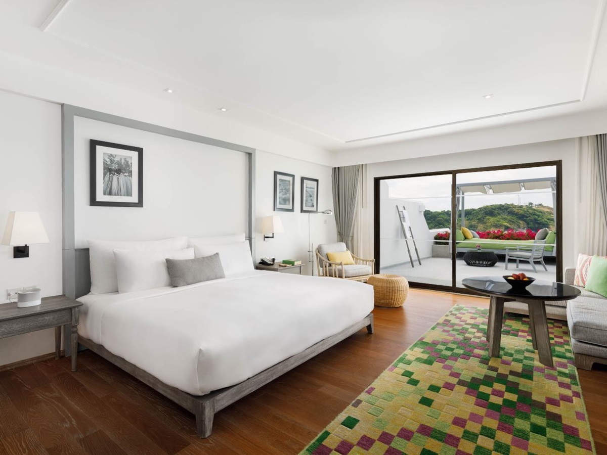 Grand ocean room bedroom at The Nai Harn resort in the Phuket region of Thailand