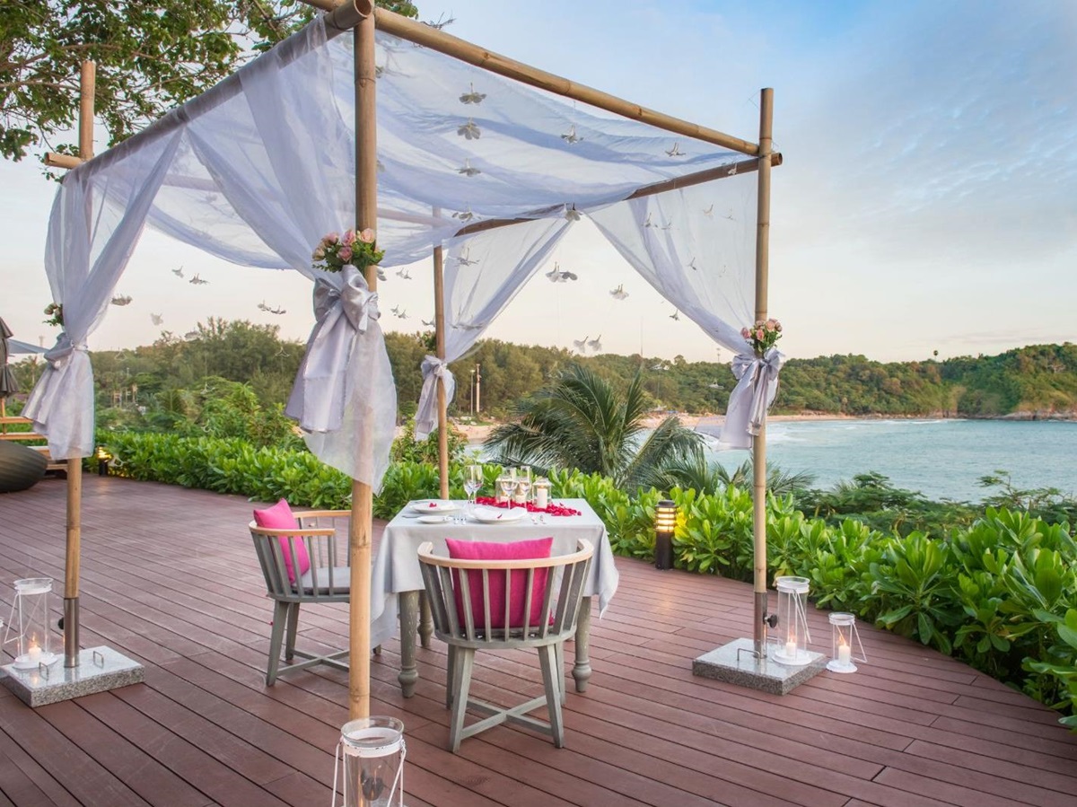 Private dinner setup at The Nai Harn resort in the Phuket region of Thailand