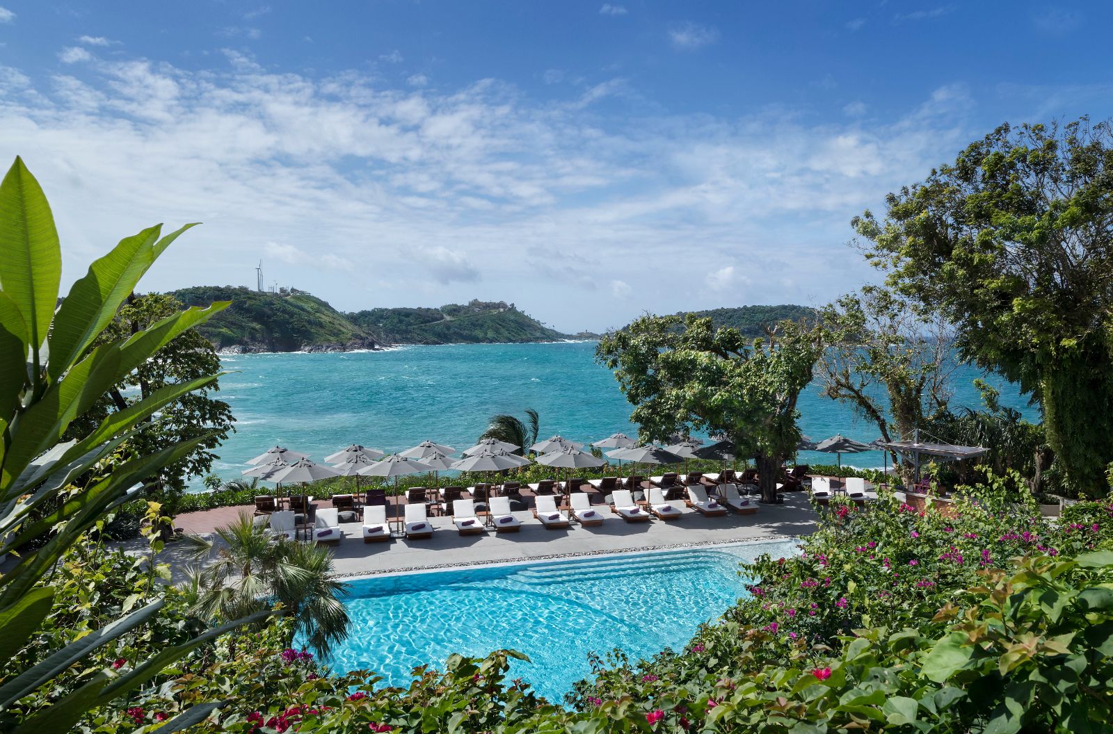 Swimming pool aerial view with ocean at The Nai Harn resort in the Phuket region of Thailand