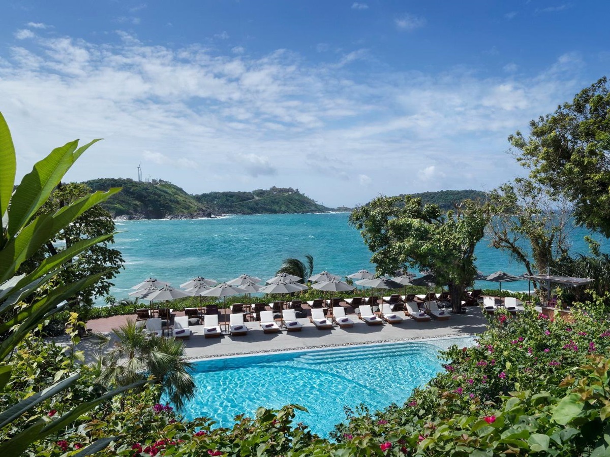 Swimming pool aerial view with ocean at The Nai Harn resort in the Phuket region of Thailand