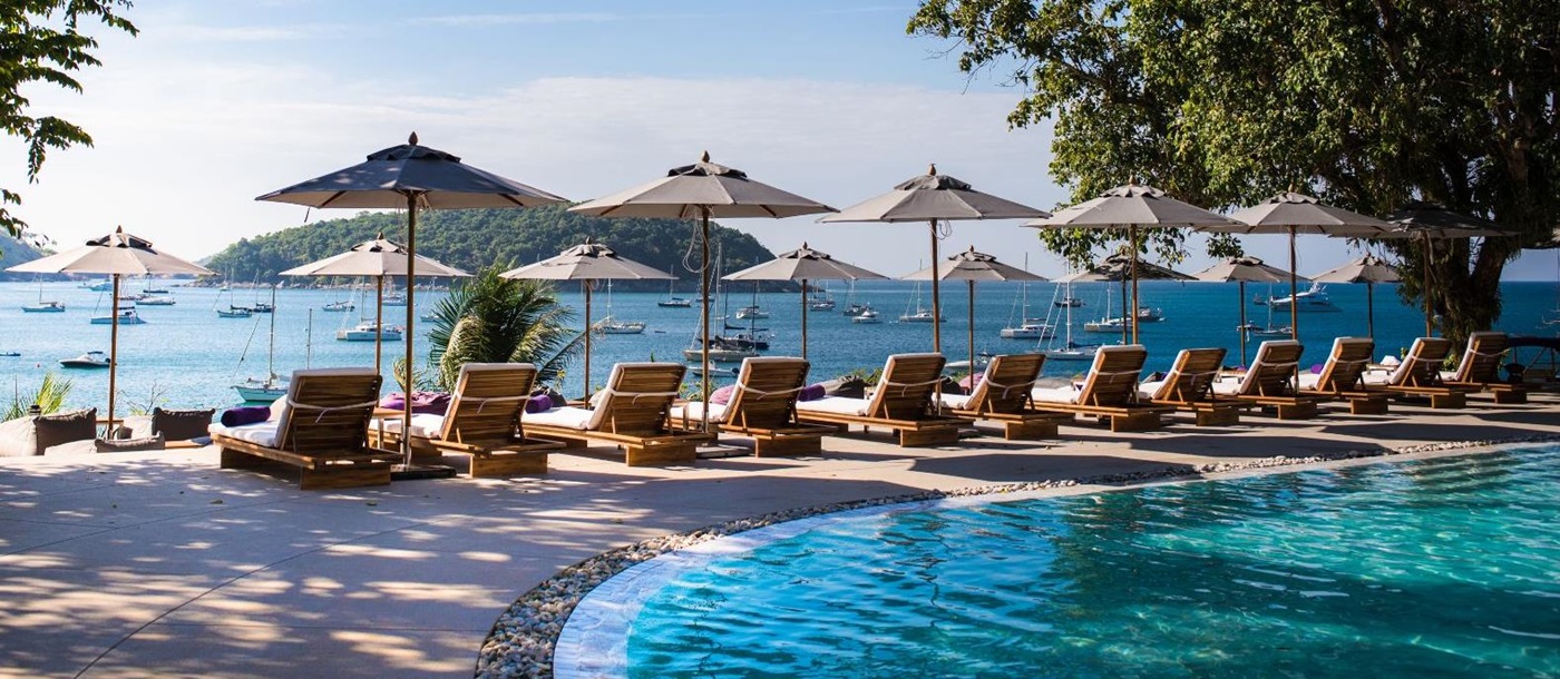 Poolside and ocean view at The Nai Harn resort in the Phuket region of Thailand