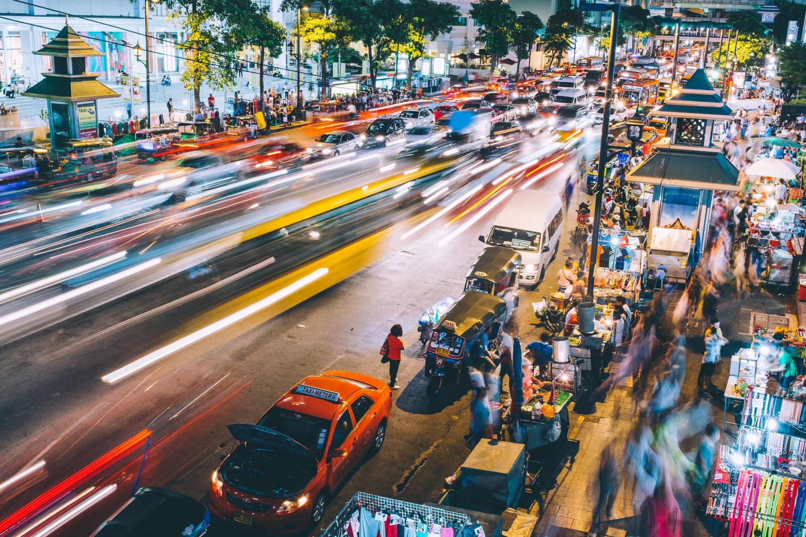 The bustling streets of Bangkok in Thailand by night
