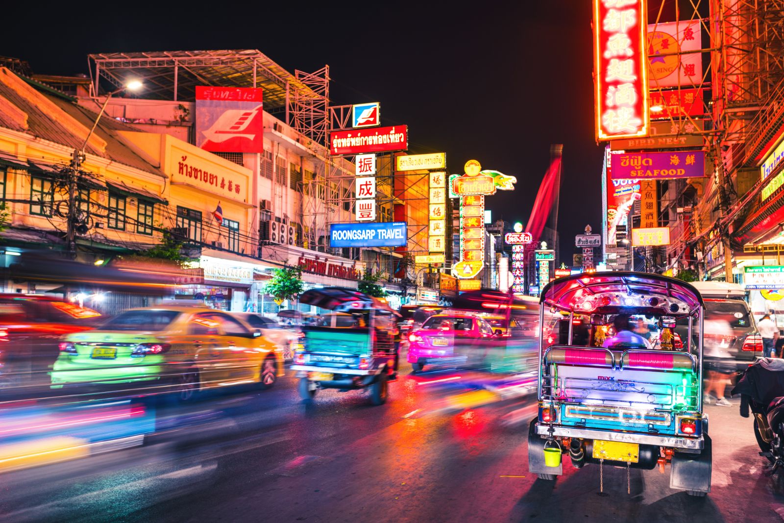 A tuk-tuk in Bangkok at night