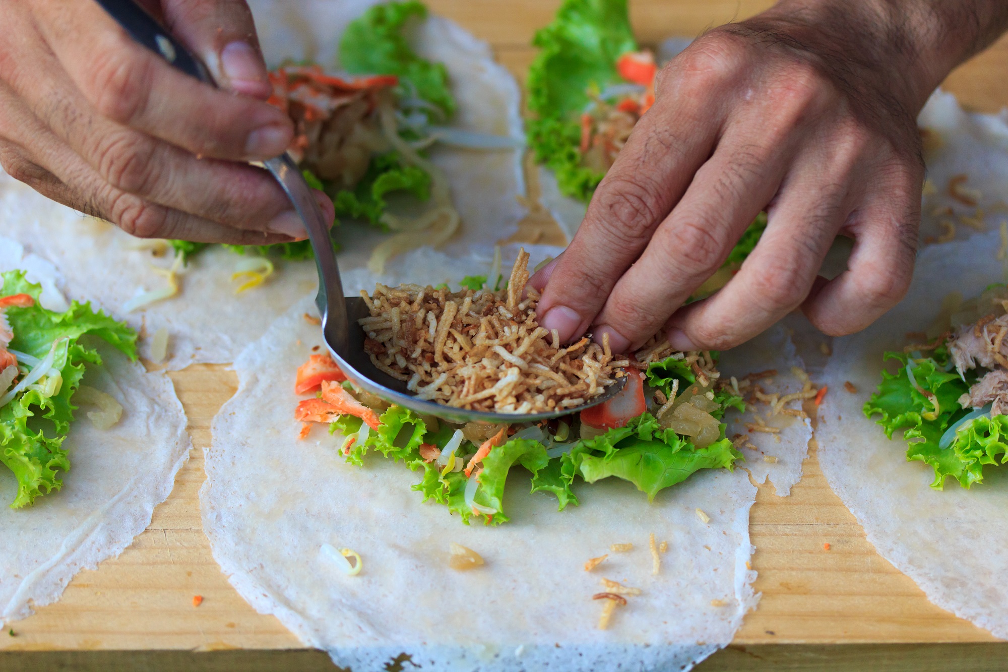 Taking part in a cookery class in Bangkok, Thailand