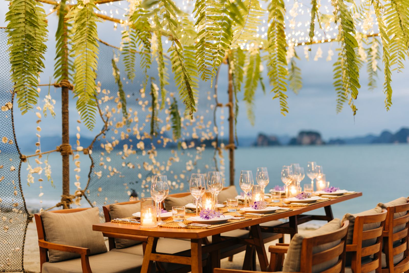 Dining on the beach at ANI Thailand villa on Koh Yao Noi island in the Pha Ngan Bay in Thailand