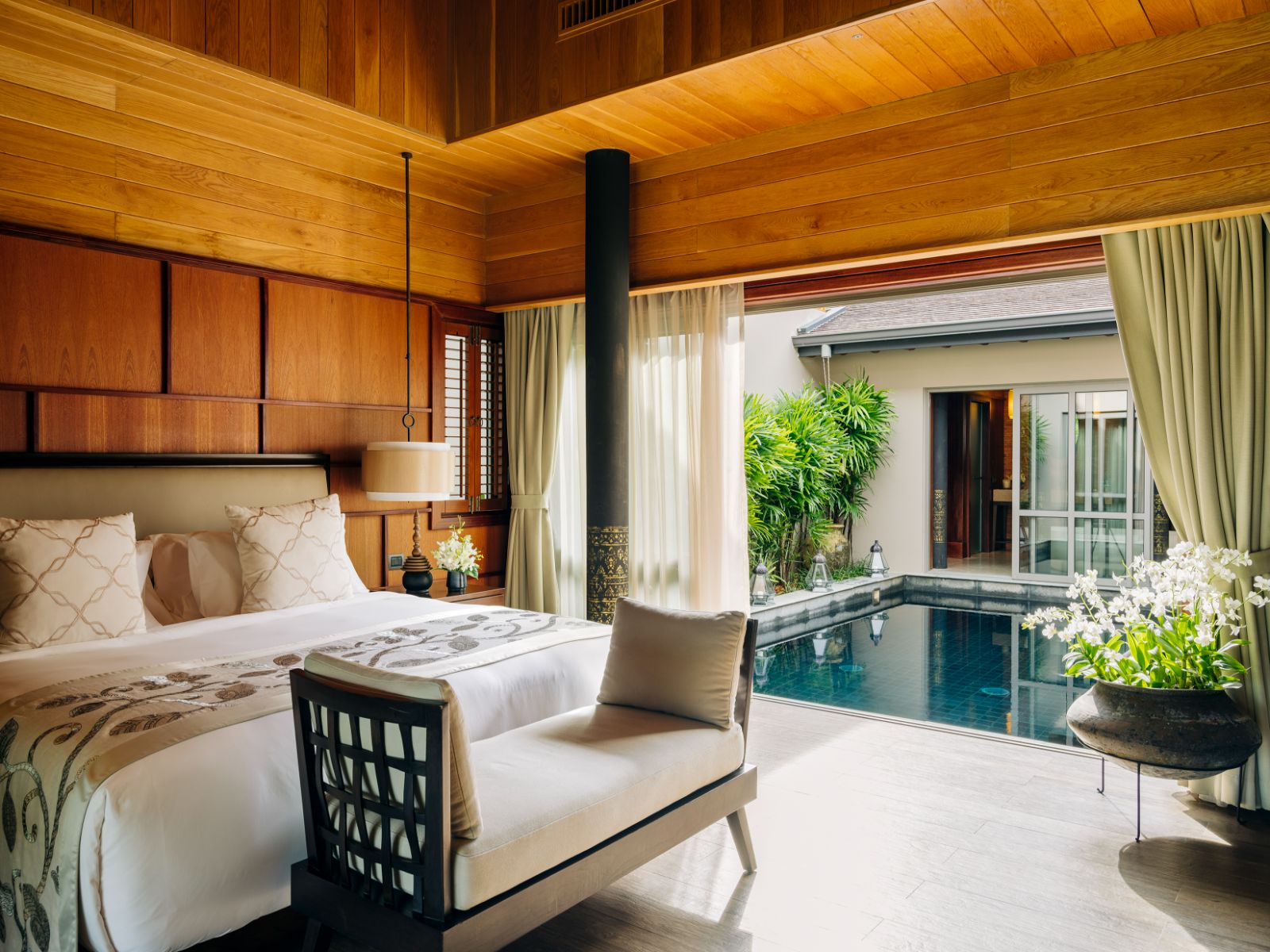 Pool suite bedroom at ANI Thailand villa on Koh Yao Noi island in the Pha Ngan Bay in Thailand