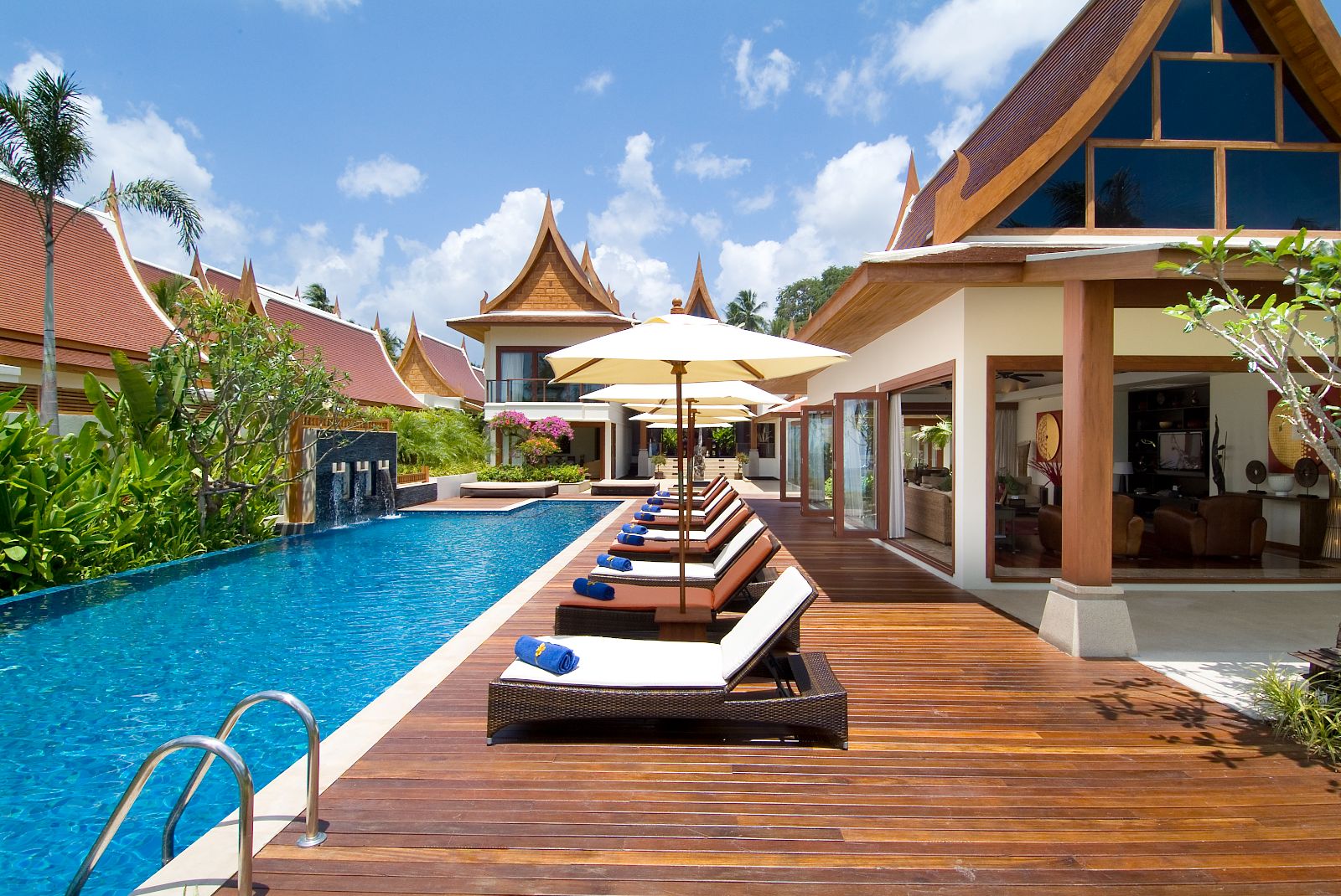 Loungers by the pool at Baan Samlarn on the west coast of Koh Samui in Thailand