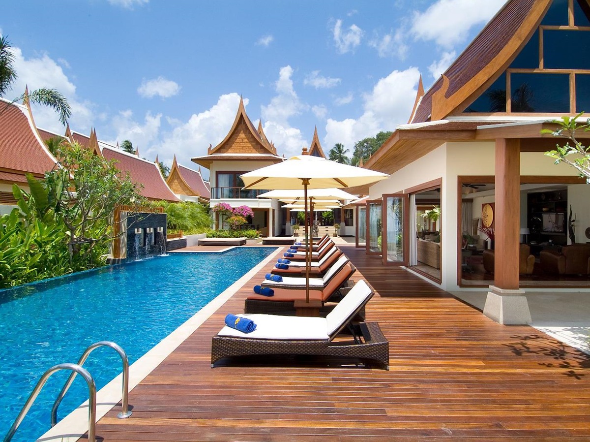 Loungers by the pool at Baan Samlarn on the west coast of Koh Samui in Thailand