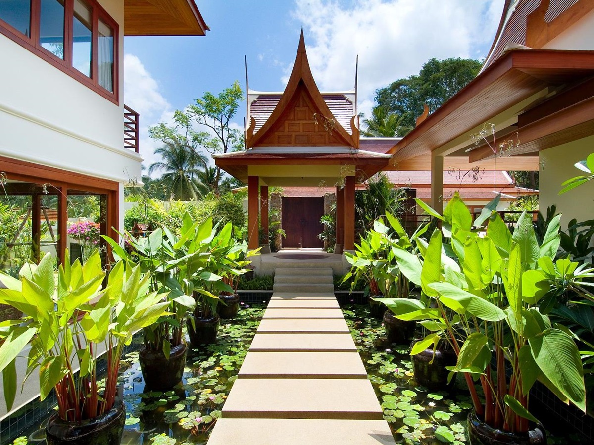 Walkway between salas at Baan Samlarn villa on the west coast of Koh Samui in Thailand
