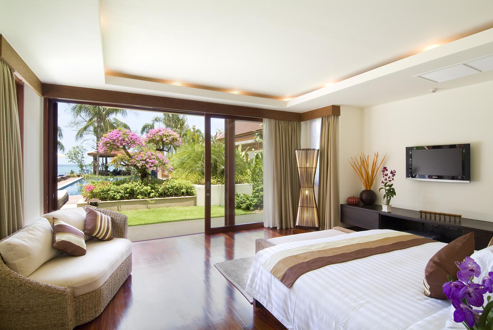 double bedroom with garden access at baan samlarn, thailand