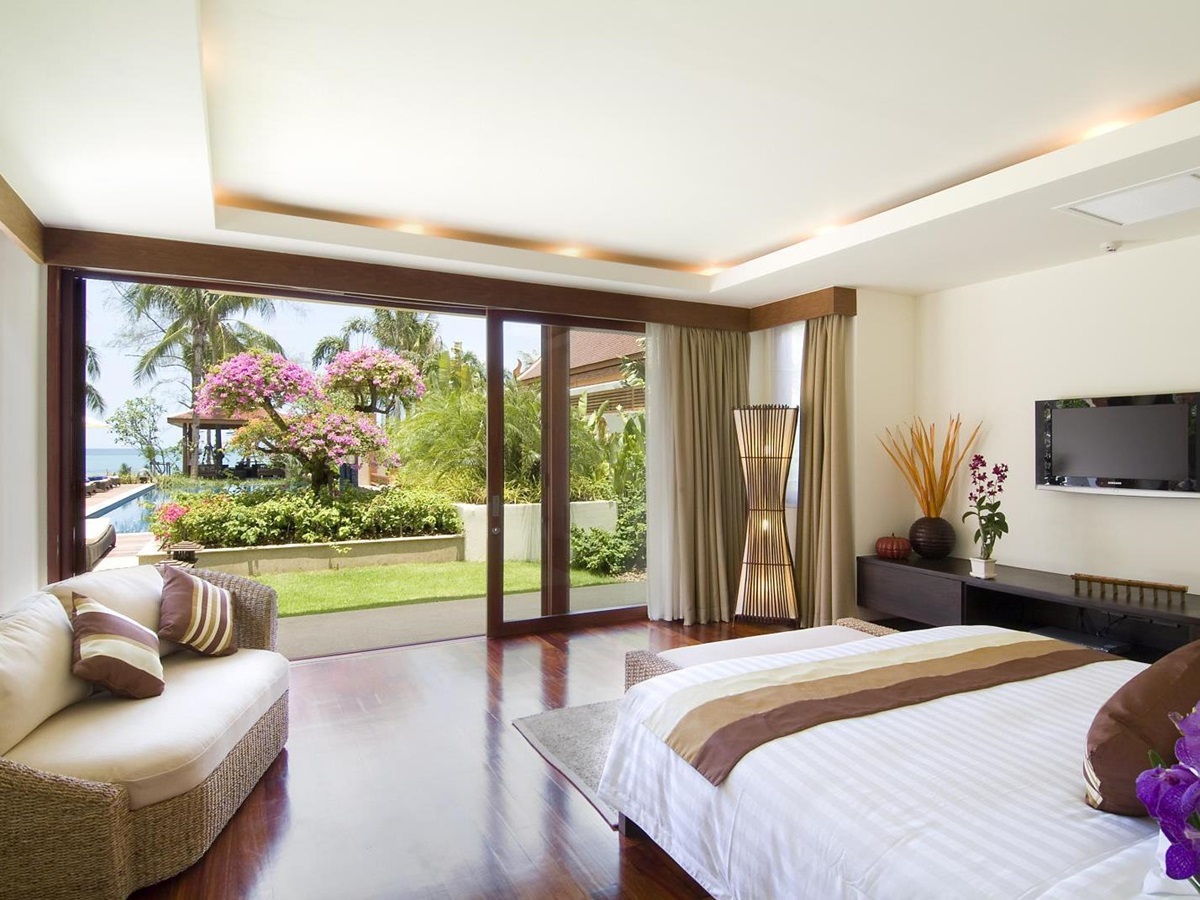 double bedroom with garden access at baan samlarn, thailand
