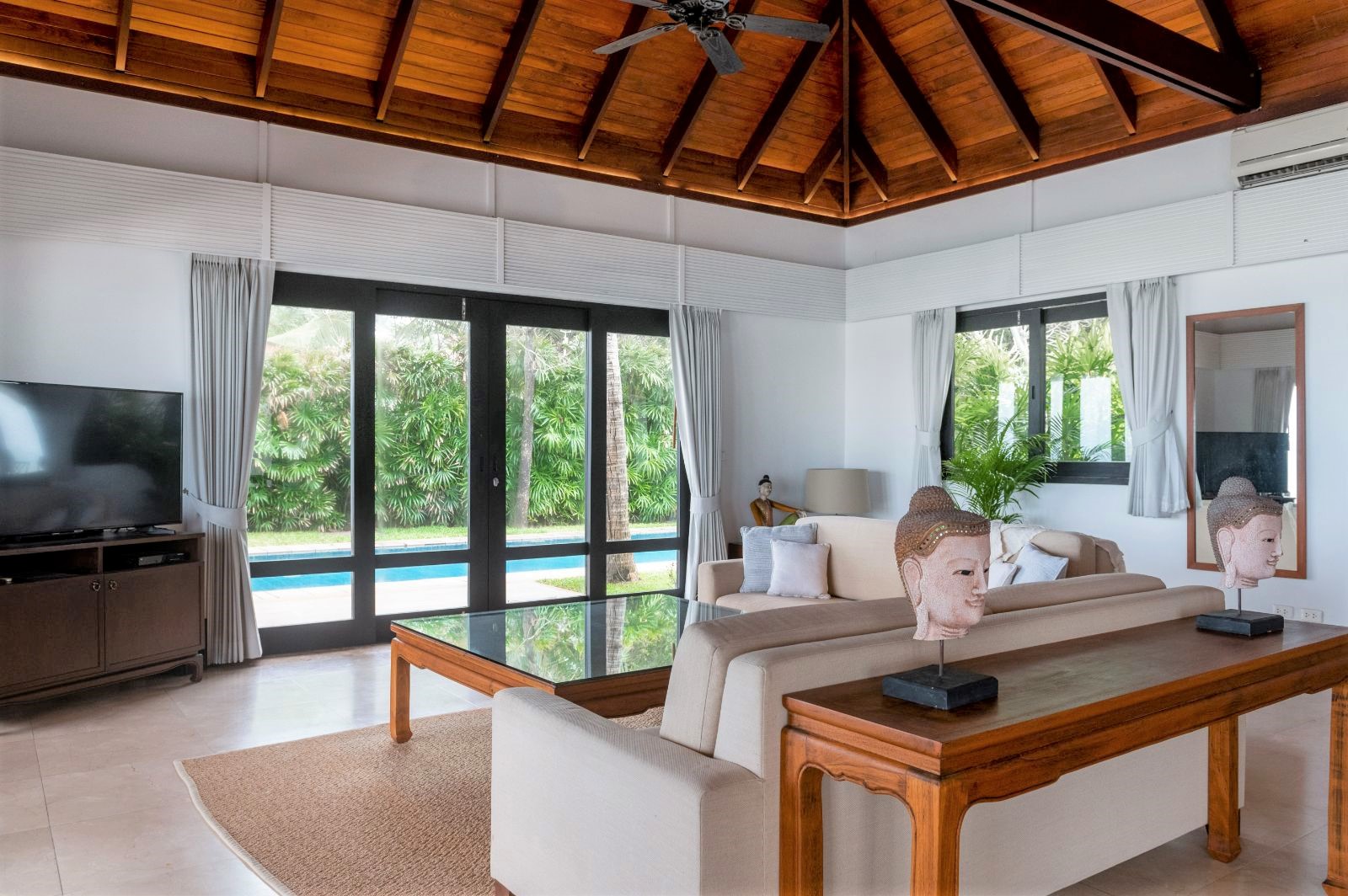 Living room and pool view at Villa Hibiscus on Koh Samui in Thailand