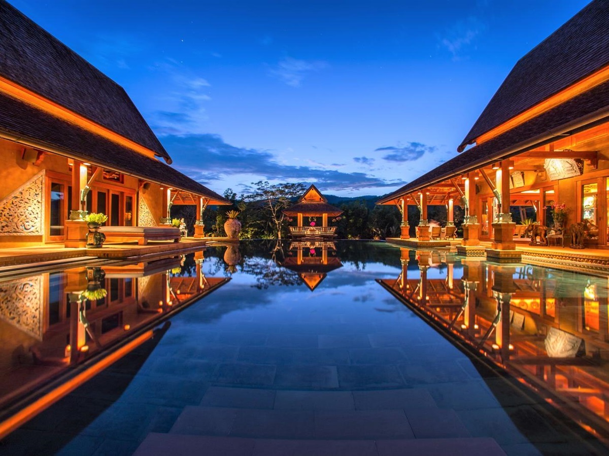 Night time view of the pool at Howie's HomeStay in Chiang Mai, Thailand