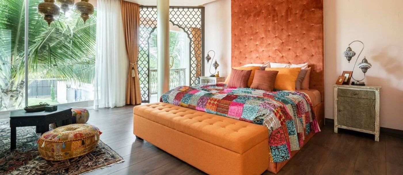 Moroccan guest suite bed at Palm Villa in Thailand's Chiang Mai region