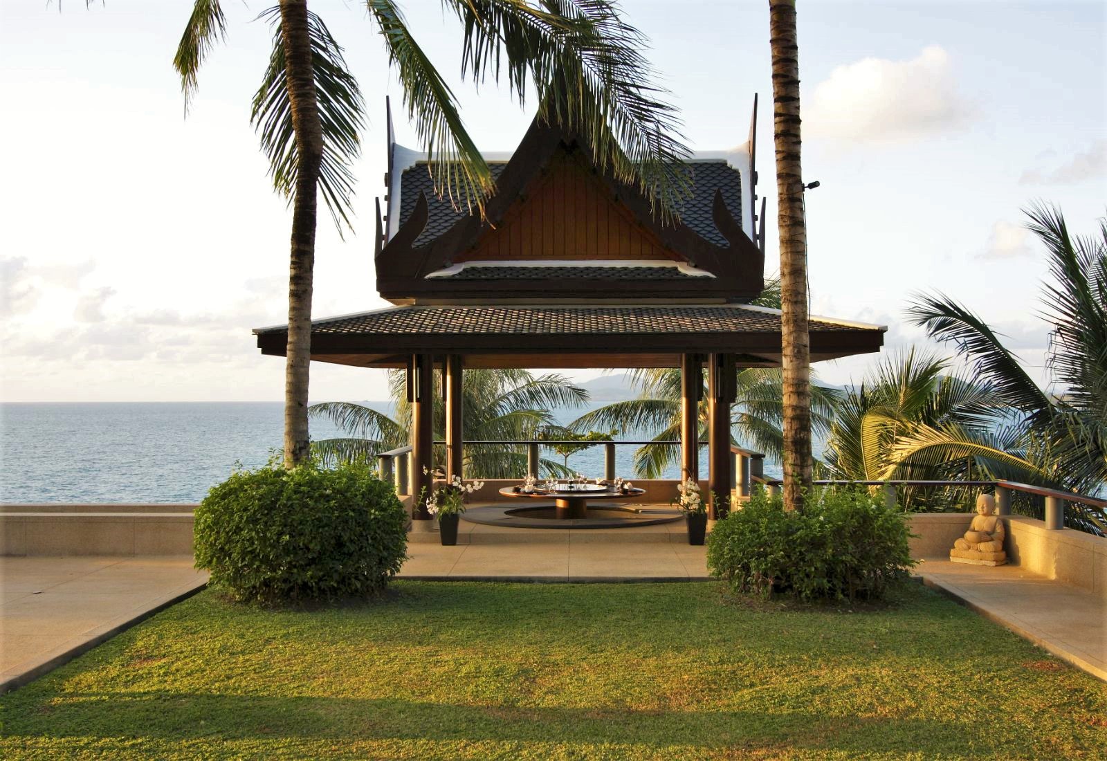 Garden terrave overlooking the ocean at Villa Laemson on the island of Phuket in Thailand